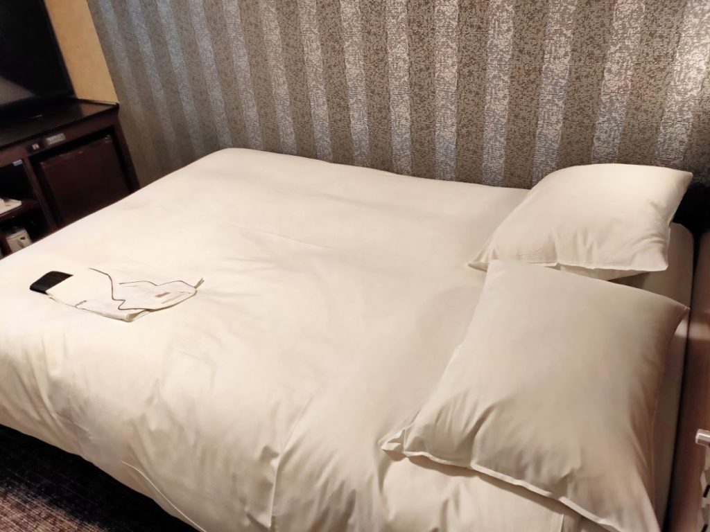 リッチモンドホテルのシングルルームベッド